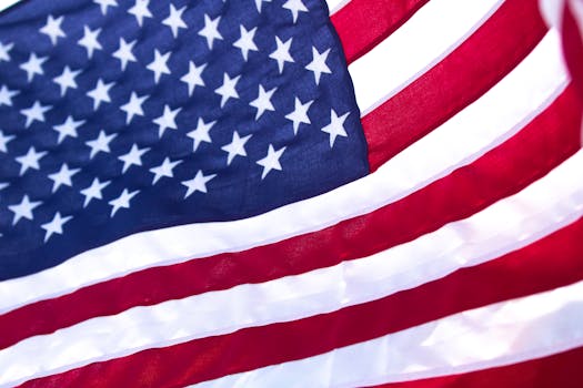 Close-up of the American flag featuring stars and stripes showcasing patriotism and national pride.